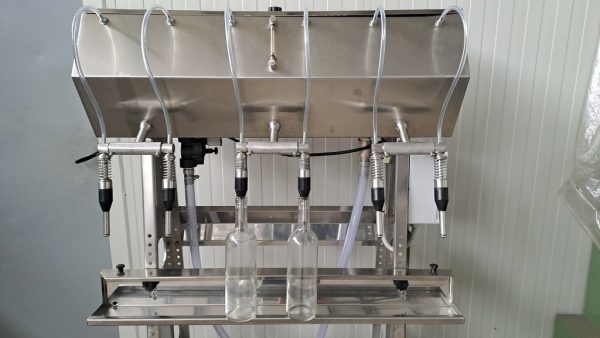 IN-LINE FILLER - 6 NOZZLES - IN STAINLESS STEEL WITH PUMP AND PROBES  ON WHEELS, SECOND-HAND MACHINE - Image 5