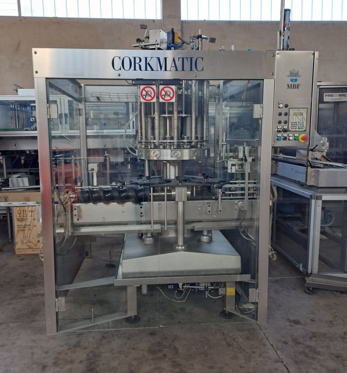 MBF 12-HEAD CORKING MACHINE FOR MUSHROOM AND NATURAL CORKS, MODEL CORKMATIC R/S, WITH NERI CAP FEEDER, USED MACHINE MBF 12-HEAD CORKING MACHINE FOR MUSHROOM AND NATURAL CORKS, MODEL CORKMATIC R/S, WITH NERI CAP FEEDER, USED MACHINE