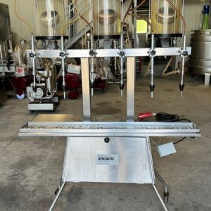 RIEMPITRICE LINEARE A 6 BECCHI IN ACCIAIO INOX ENOBERG A DEPRESSIONE, MARCA ENOBERG, MACCHINA USATA