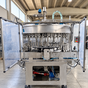 DEPRESSION FILLING MACHINE COBERT OLIMPIA WITH 48 VALVES FOR OIL, YEAR 1990, SECOND-HAND MACHINE