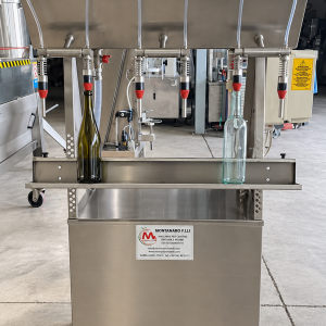 IN-LINE FILLER 6 NOZZLES FIRM IN STAINLESS STEEL ON WHEELS, SECOND HAND MACHINE